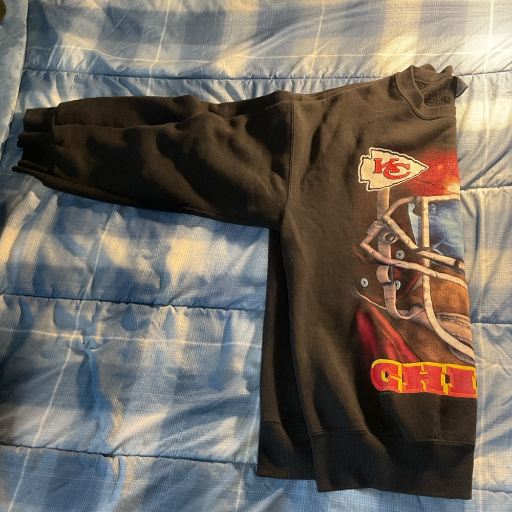 Black Chiefs Sweatshirt with Helmet Graphic